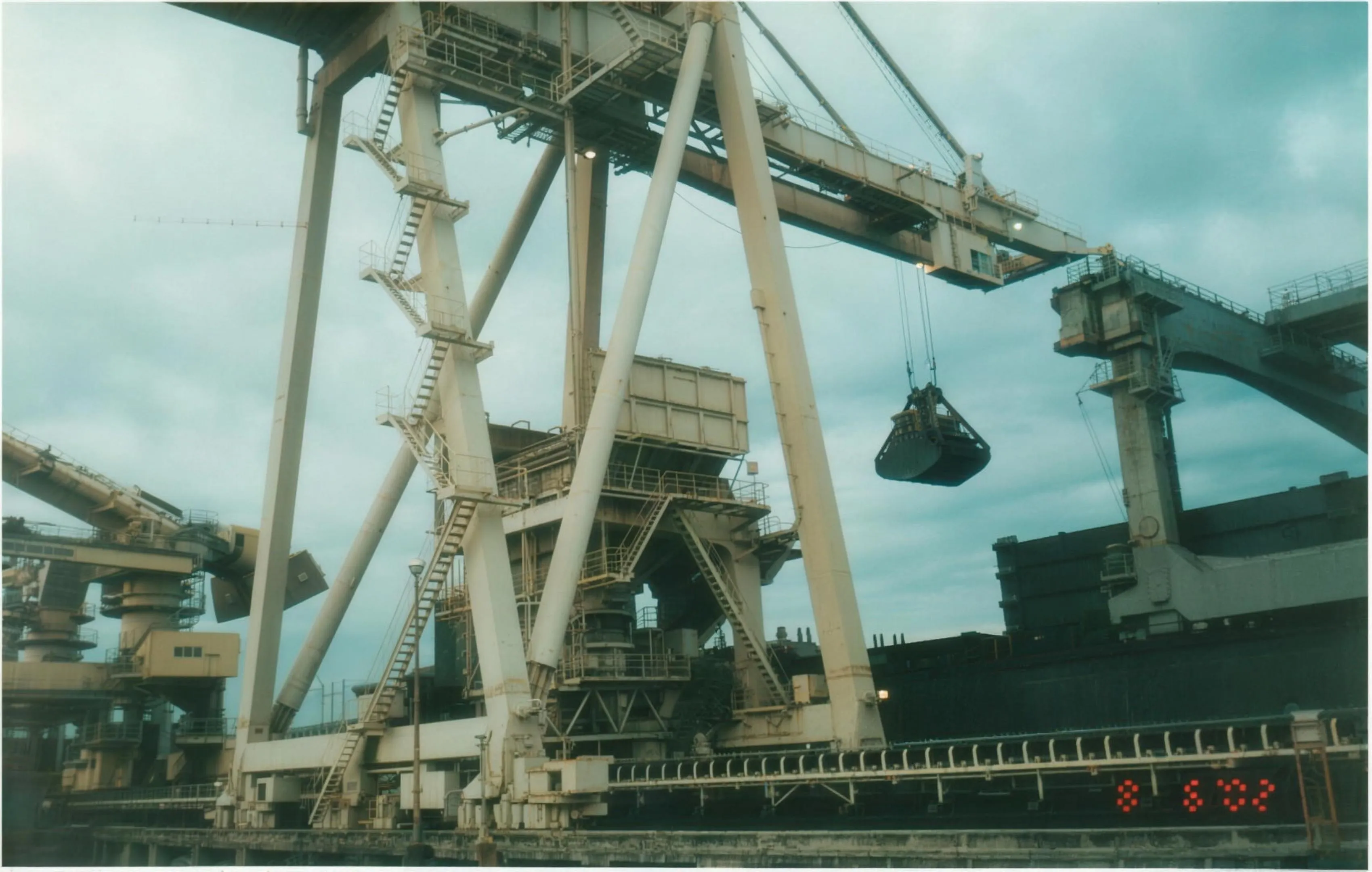 M/V Delgado: Discharging coal at the National Power Corporation pier, Calaca, Batangas.